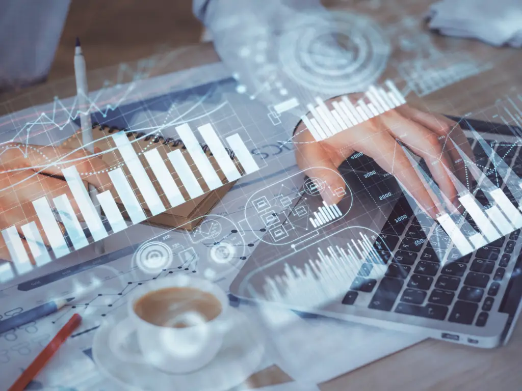 Forex graph with businessman working on computer in office.