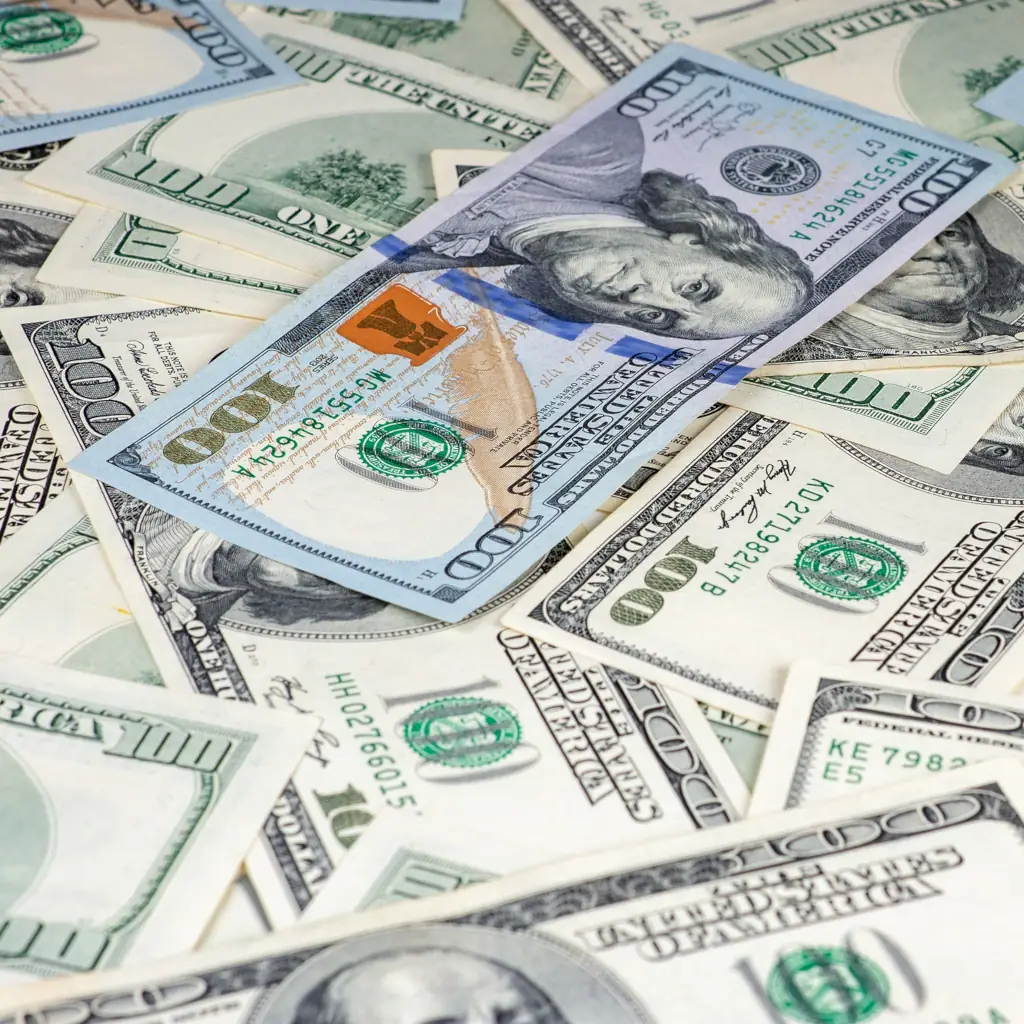 Pile of various US dollar bills