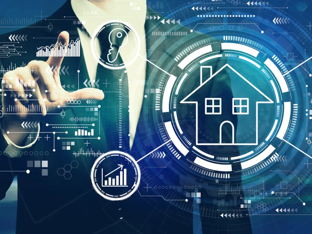 Digital house concept with businessman and graphics